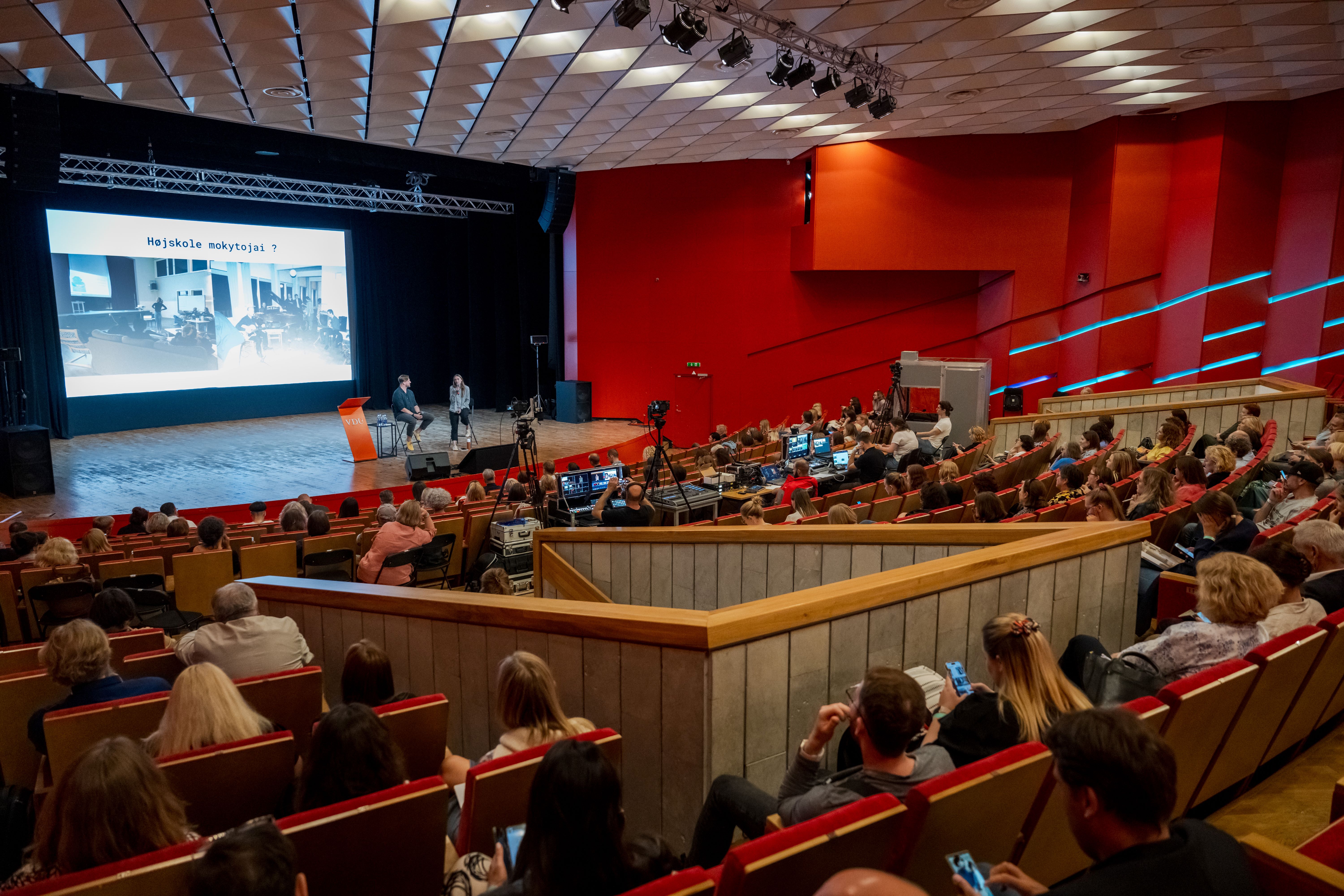 Talk in the auditorium during the event